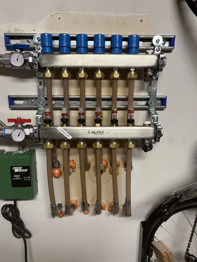 Plumber performing Leak Detection at a residential property in Evergreen